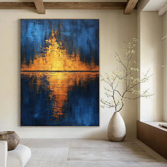 Contemporary hand-painted abstract art featuring golden light reflections on water with blue and gold hues enhanced by gold foil and textured canvas. DLZ0506