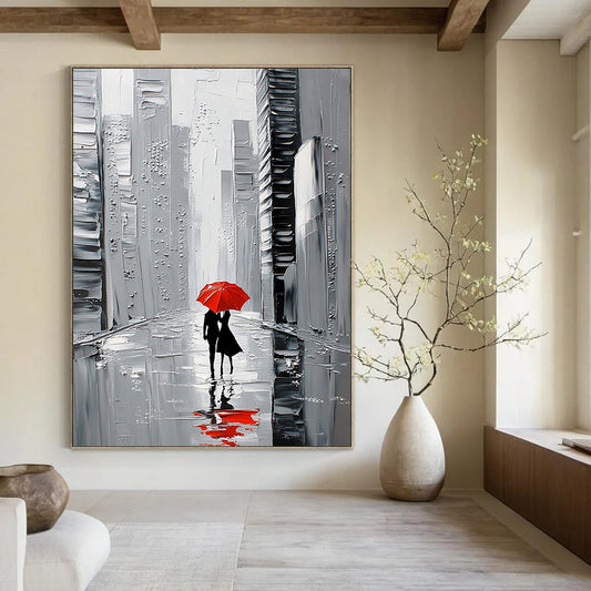 Contemporary abstract painting featuring a white skyline with black skyscrapers a couple walking under a red umbrella on a reflective wet street. DLZ1652