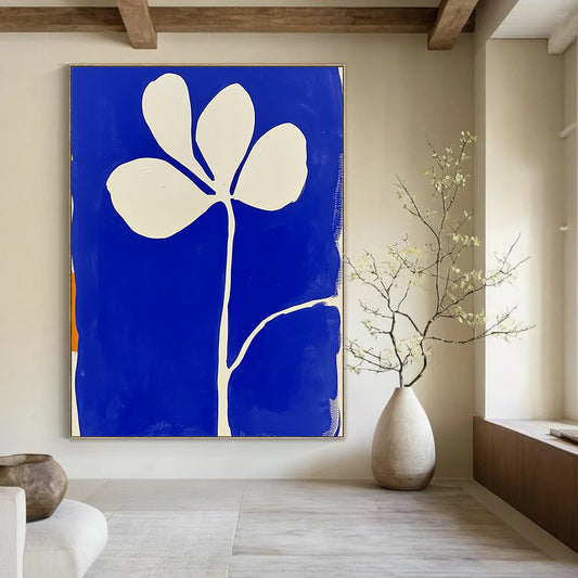 Large contemporary abstract painting featuring blue and white minimalist flower shapes in the style of Matisse with block print aesthetics. DLZ1154