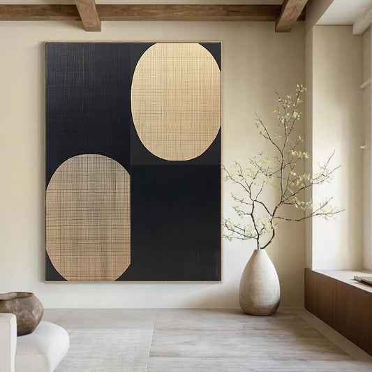 Large contemporary hand-painted abstract artwork features black and beige ovals on a warm wood grain background in a minimalist style. DLZ1600