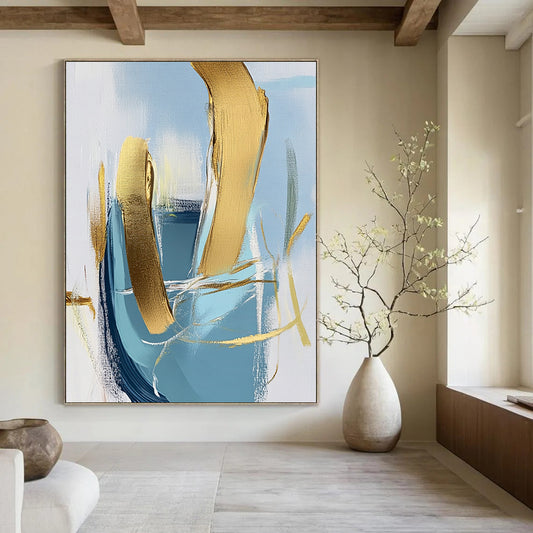 Contemporary hand-painted abstract art featuring a close-up of an armchair with gold foil accents on a light blue and white background. DLZ0573