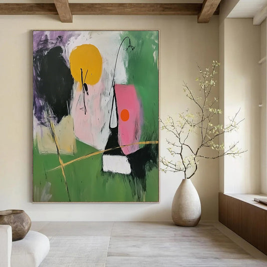 Contemporary abstract painting featuring simple shapes in green and pink with black lines and a central figure holding golden sticks. DLZ0683