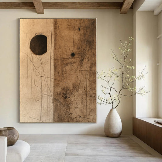 Contemporary hand-painted abstract art features textured brown paper with dark stains and a small hole, complemented by a striking cardboard piece. DLZ1089