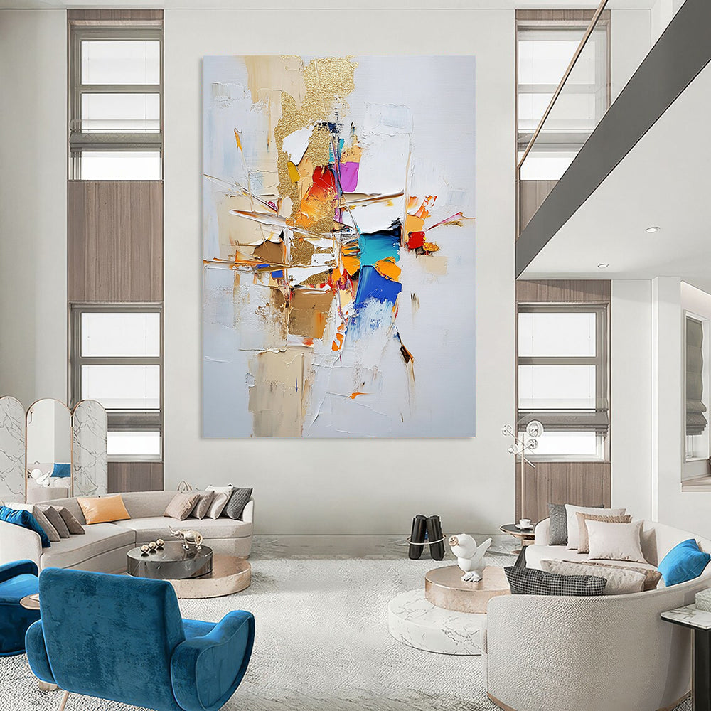 Contemporary large abstract painting featuring gold leaf and textured strokes in neutral tones with vibrant accents on a white background. DLZ0744