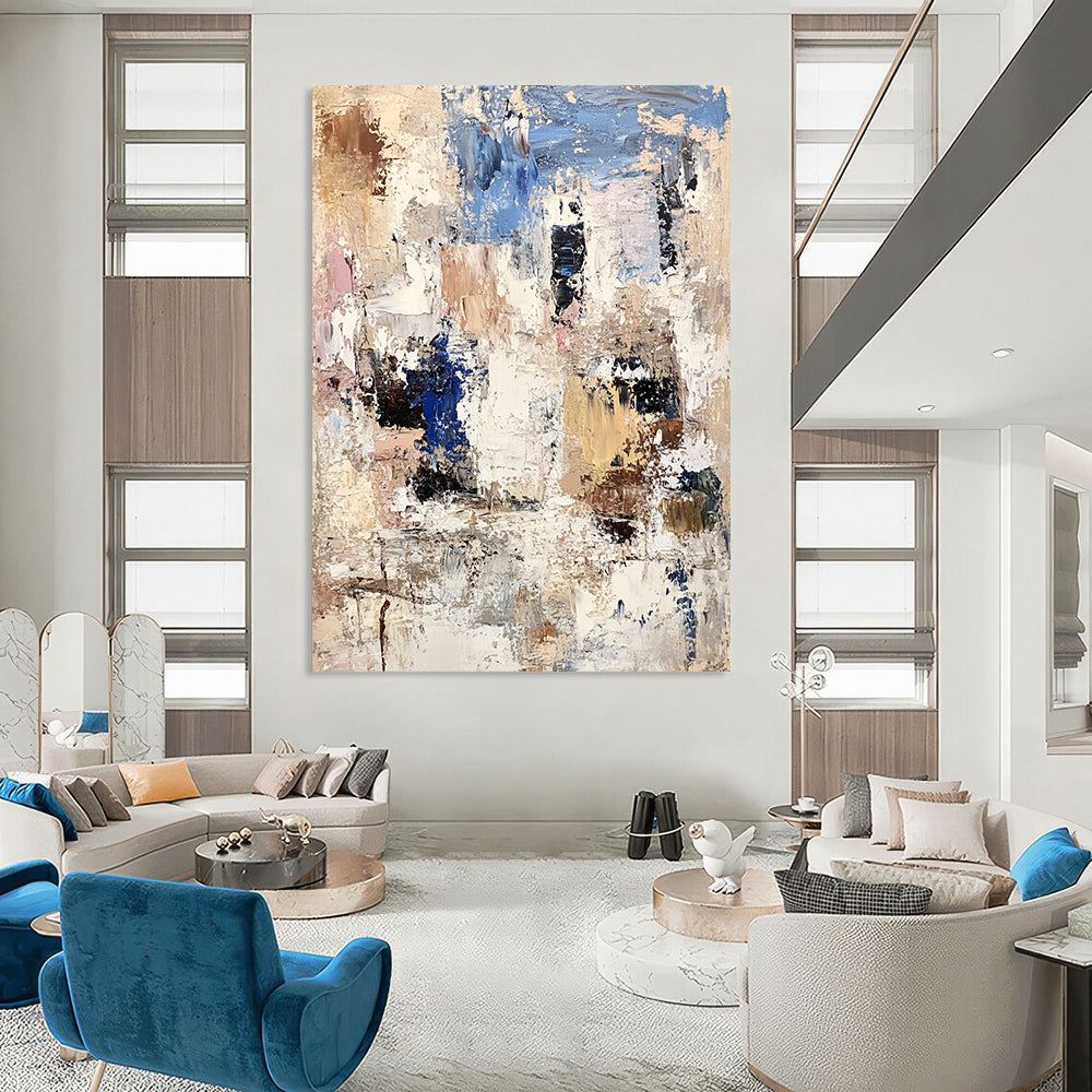 Contemporary abstract artwork showcasing textured white rocks and buildings with bold brushstrokes in beige, brown, blue, and gray. DLZ0898