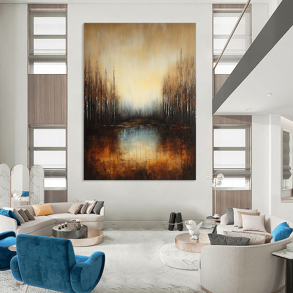 Large contemporary abstract painting featuring a deep brown and grey gradient with earthy orange hues and reflective water surrounded by soft blue trees. DLZ1294