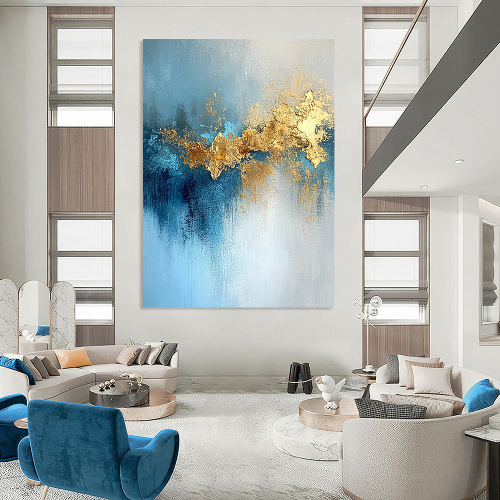 Contemporary hand-painted abstract artwork featuring gold leaf, soft light, blue tones, atmospheric clouds, and a mysterious shimmering texture. DLZ0336