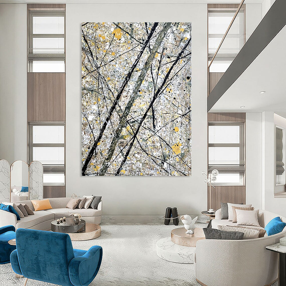 Large contemporary hand-painted abstract artwork features gray and yellow splashes alongside intricate black lines representing tree branches. DLZ1587