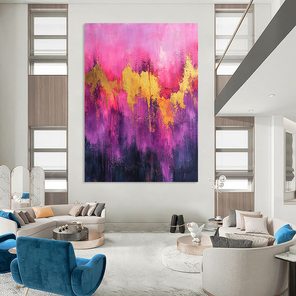 Contemporary abstract artwork featuring vibrant pink and purple tones with gold accents and dynamic splatter drips on textured canvas. DLZ0909