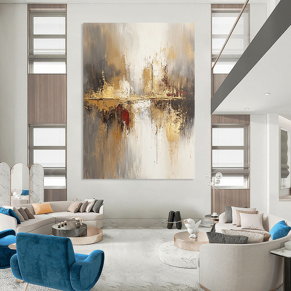 Large contemporary abstract painting featuring soft beige and gray tones enhanced with gold accents and a blurred background for a modern aesthetic. DLZ0759