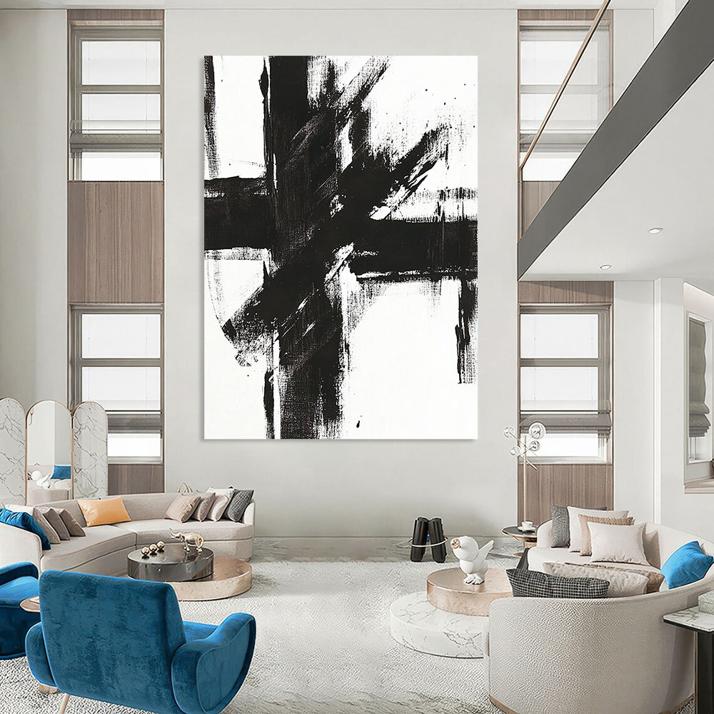 Contemporary abstract painting features a bold black and white cross with striking brush strokes on a bright canvas. DLZ0271