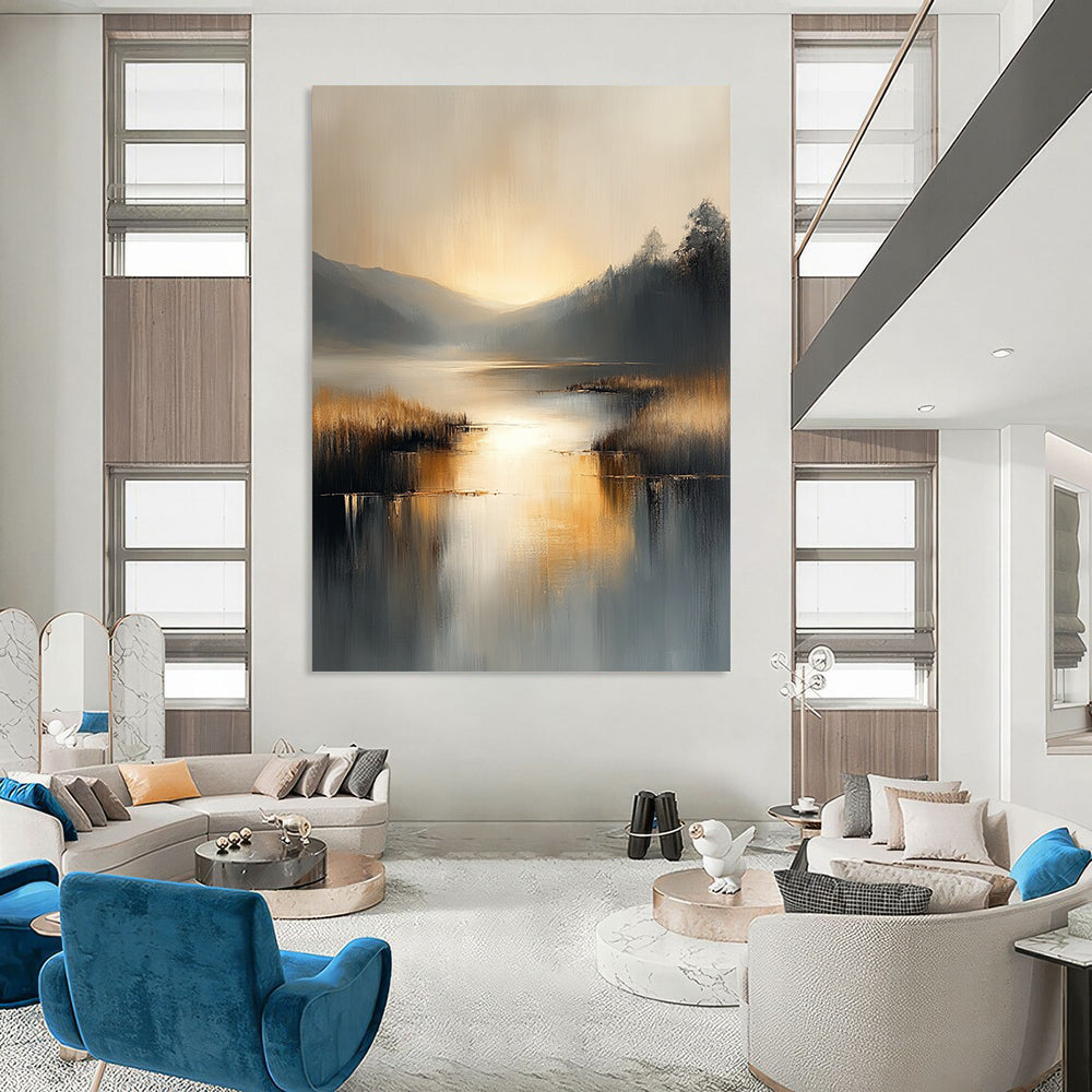 Contemporary abstract painting with soft gray and beige tones reflecting on water evokes serenity in a large canvas illuminated by golden hour light. DLZ0417