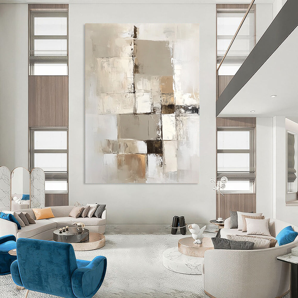 Large contemporary abstract painting with a beige and white palette showcasing geometric shapes and textures on a vertical canvas. DLZ0697
