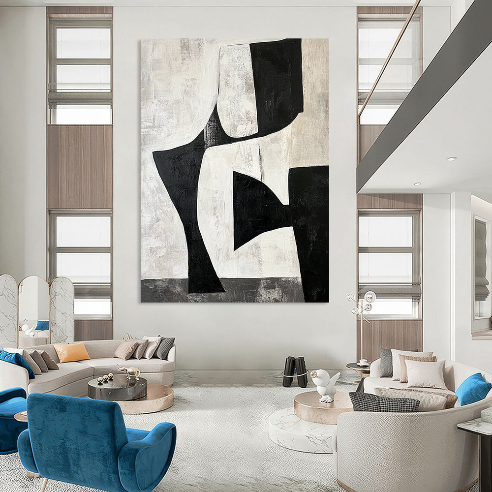 Contemporary hand-painted abstract artwork featuring black and white shapes creating negative space resembling legs against a gray-toned background. DLZ1392