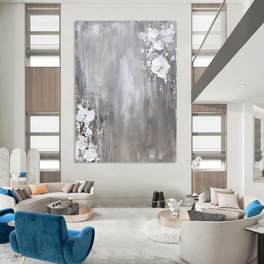 Contemporary hand-painted abstract art featuring a neutral gray and white palette with dynamic paint splashes on canvas for a minimalist aesthetic. DLZ0715