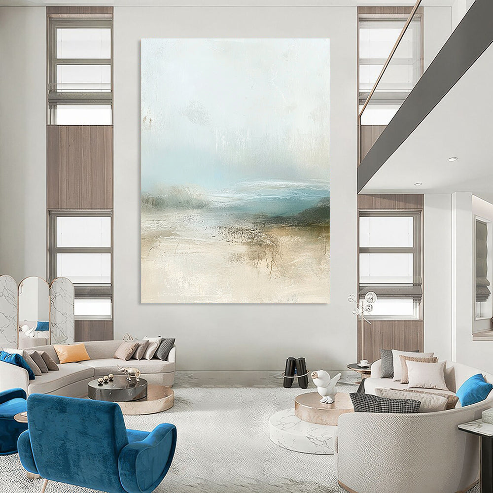 Contemporary abstract painting featuring muted pastel colors and calming beige and pale blue tones with soft atmospheric clouds. DLZ0282