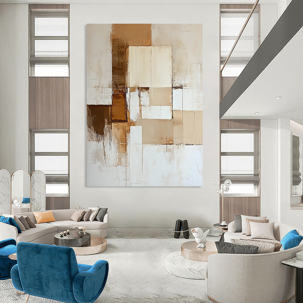 Contemporary hand-painted abstract artwork features neutral tones of beige and white with dynamic color blocks and a striking brown accent. DLZ0527