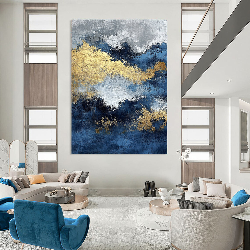 Contemporary abstract painting featuring blue and gold textures with ocean waves and dark silver clouds creating depth and mystery. DLZ0341