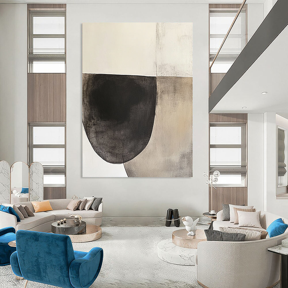 Contemporary hand-painted abstract artwork featuring an oval shape in dark charcoal and beige tones on textured white paper, inspired by minimalist design. DLZ0965