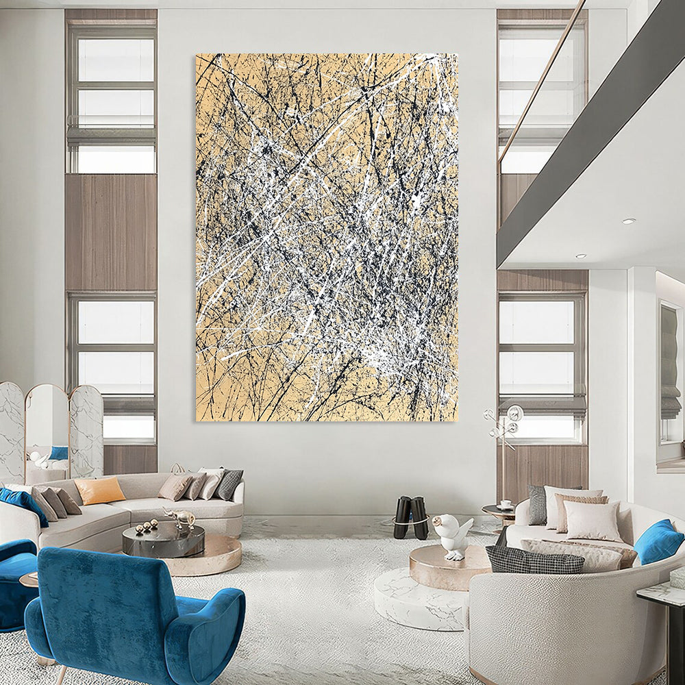 Contemporary hand-painted abstract artwork features dynamic brush strokes and expressive composition in white and black against a light brown background. DLZ1162