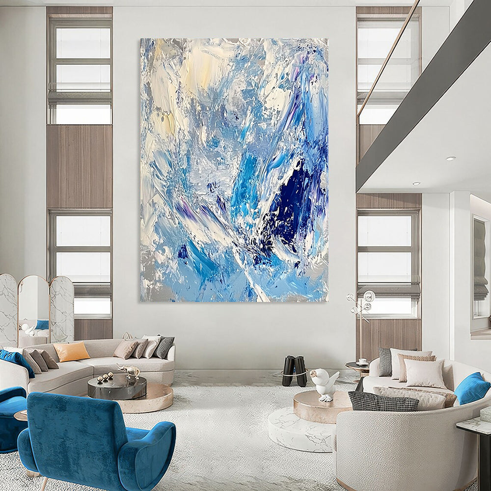 Contemporary large abstract artwork featuring thick impasto strokes in light blue, white, and silver, evoking the essence of ice and snow. DLZ0624