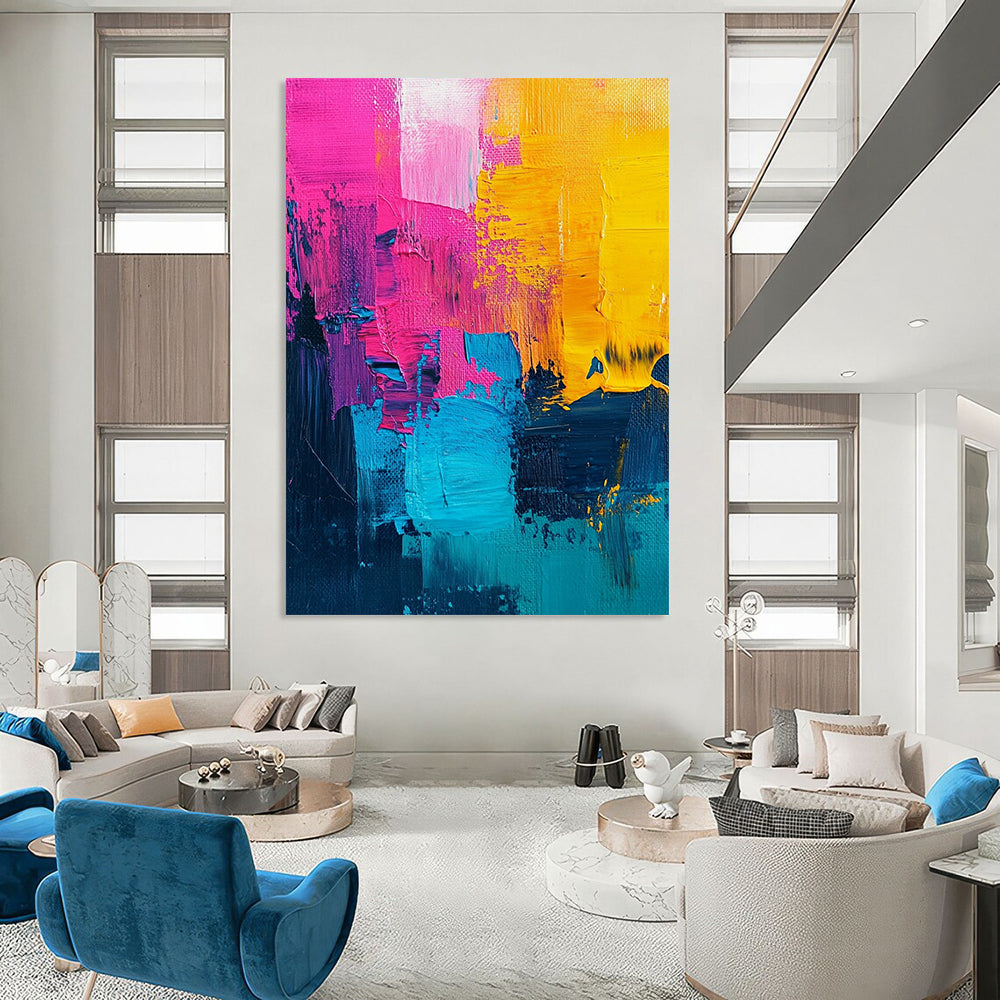 Vibrant contemporary abstract painting with bold pink and yellow accents, a striking turquoise center, and rich dark blue features, showcasing textured acrylic brush strokes. DLZ0776