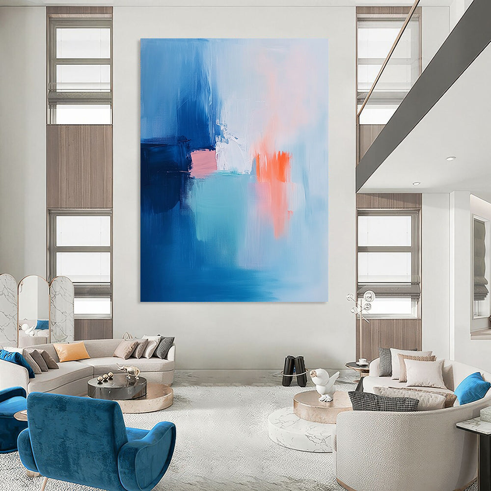 Contemporary hand-painted abstract art featuring soft brush strokes in light blue pink and white with navy blue and orange accents. DLZ1053