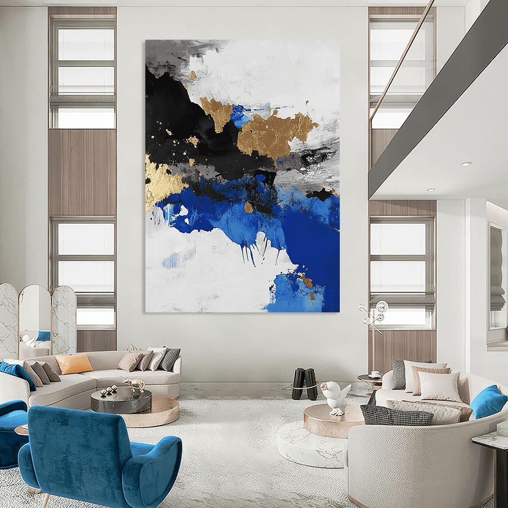 Contemporary abstract artwork showcasing an aerial view of an arctic landscape in black and white with blue accents and gold leaf highlights. DLZ0572