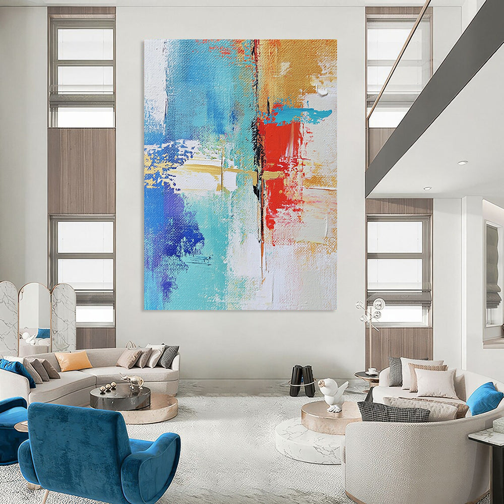 Contemporary hand-painted abstract art showcasing urban landscapes with textured brush strokes in soft neutrals and vibrant blue and red highlights DLZ0511