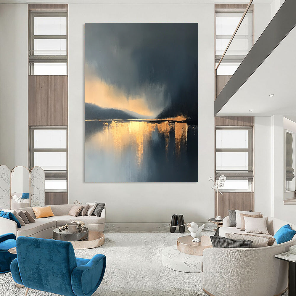Large contemporary abstract painting features a lake and sky with golden light reflections and atmospheric clouds in minimalist modern art style. DLZ0470