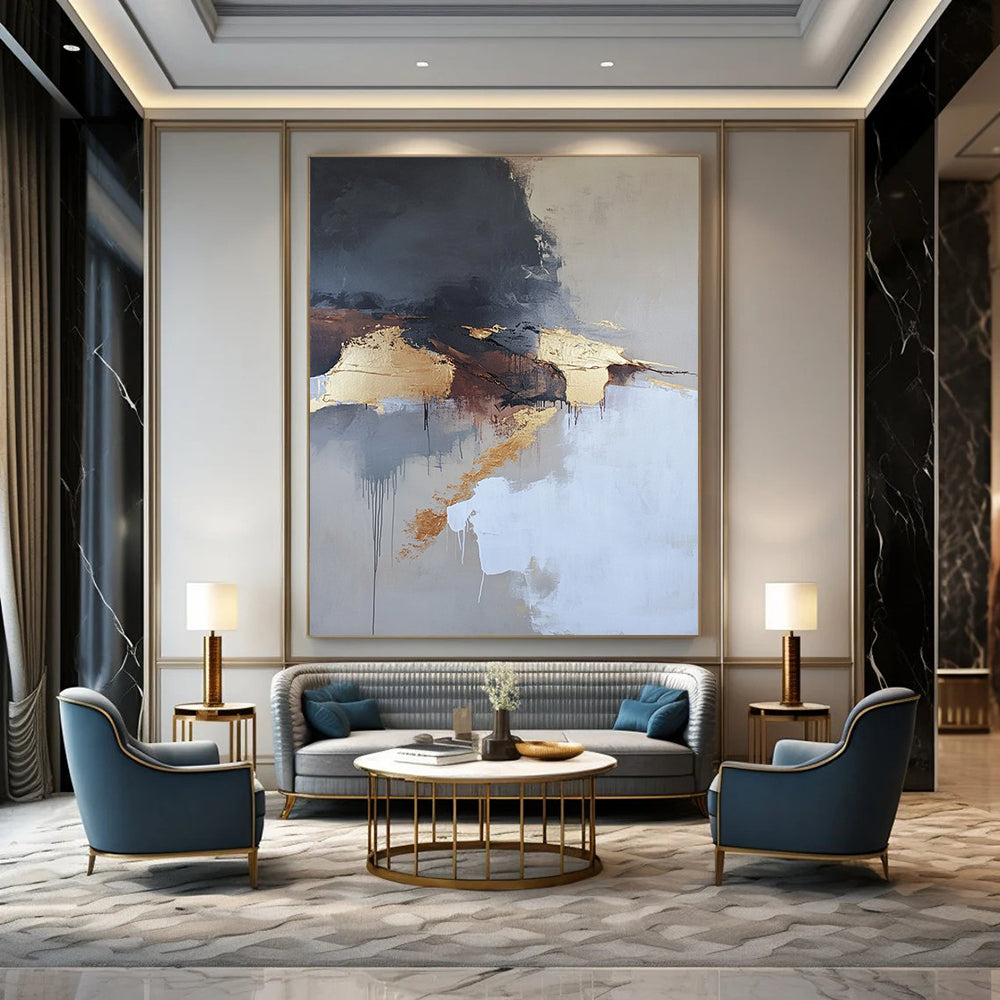 Contemporary abstract painting features aerial views with dark gray and white clouds gold elements in beige tones and thick brush strokes. DLZ0448