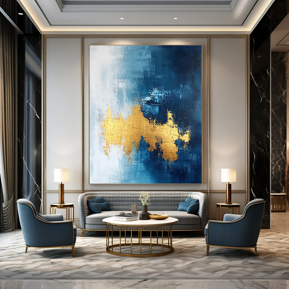Contemporary abstract painting features gold leafing on a dark blue white and light gray background with elegant brush strokes and a sophisticated texture. DLZ0334