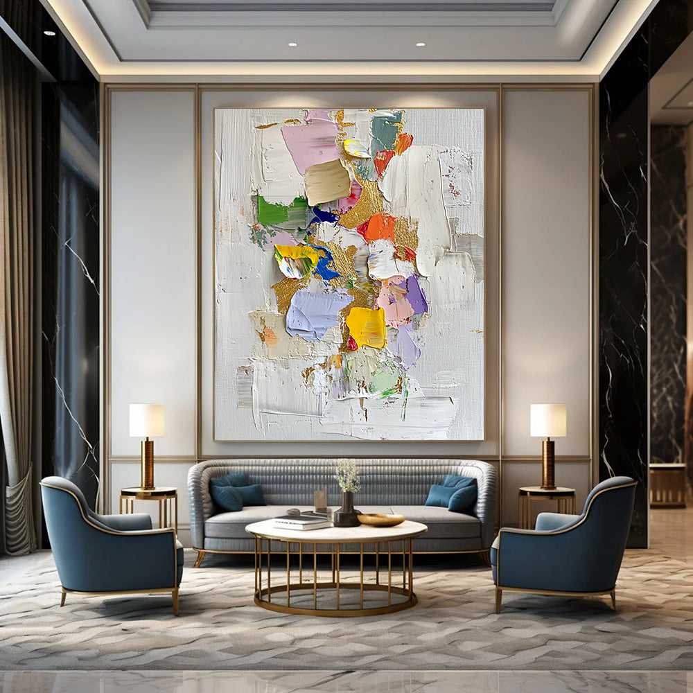 Contemporary abstract oil painting features gold leaf accents thick textures and vibrant colors on a white background with scattered colored paper pieces. DLZ0451