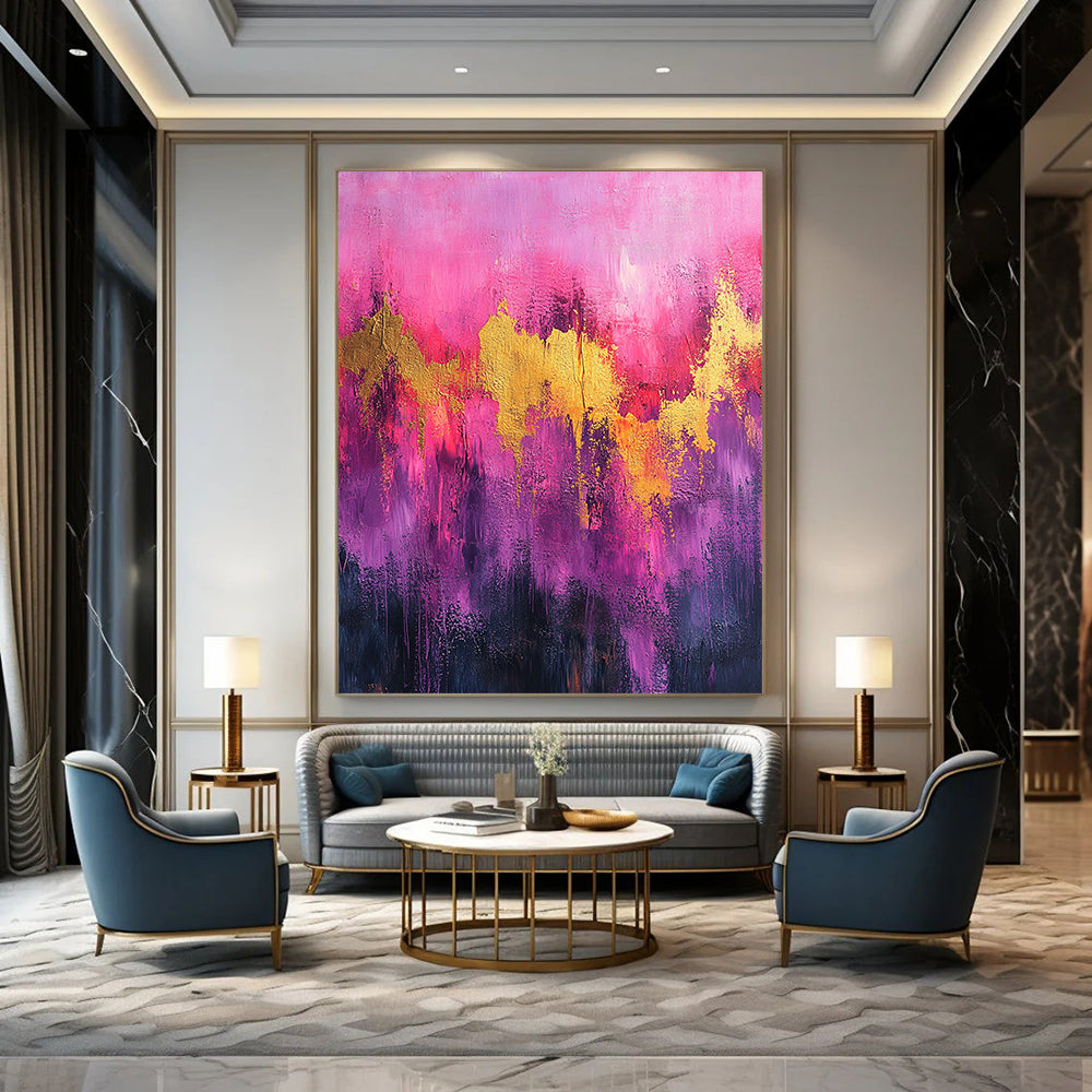 Contemporary abstract artwork featuring vibrant pink and purple tones with gold accents and dynamic splatter drips on textured canvas. DLZ0909