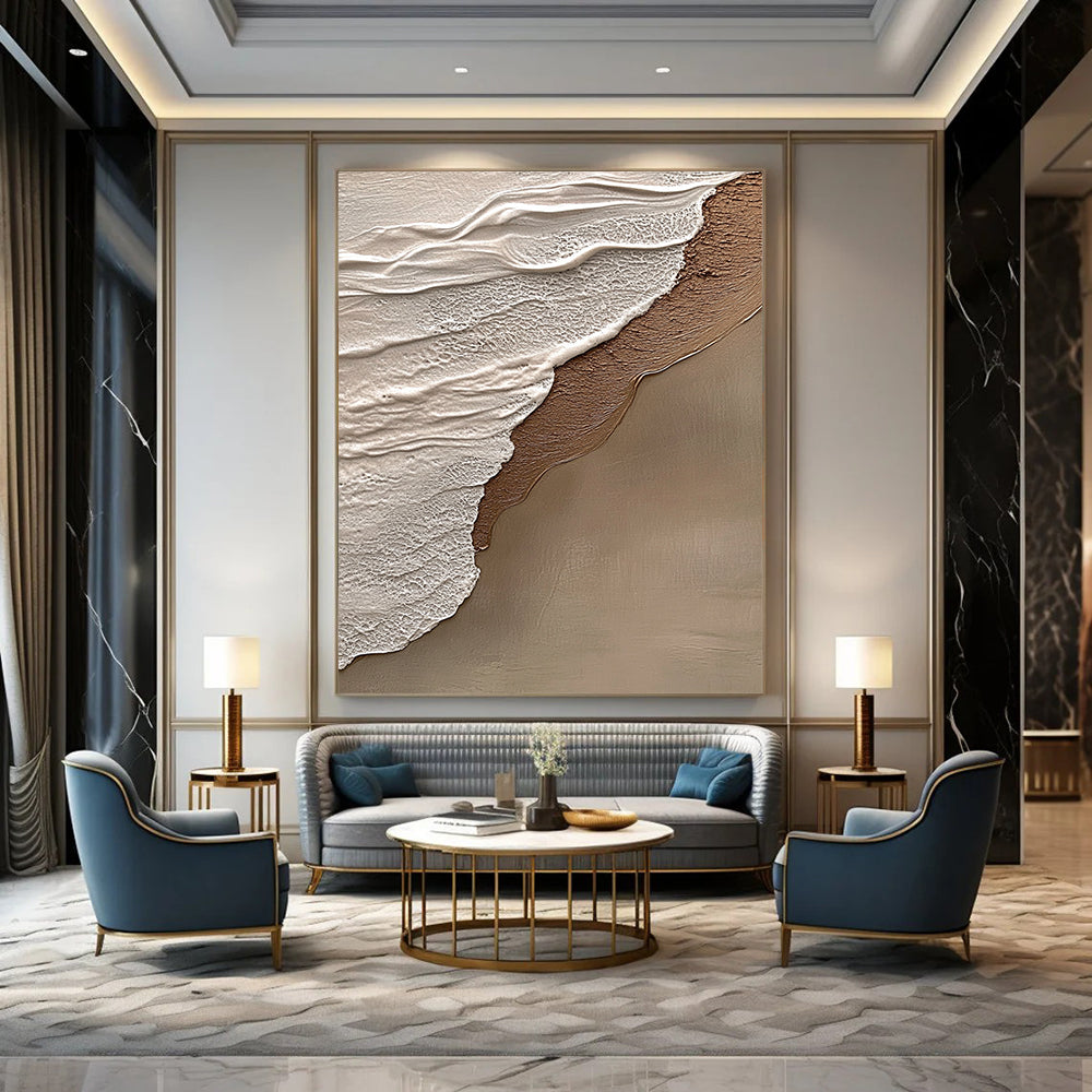 Contemporary hand-painted abstract art features beige and gray tones, evoking tranquility and harmony with a natural beach scene in the background. DLZ1212