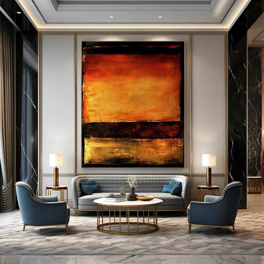 Contemporary abstract artwork features vibrant orange and brown hues with water reflections set against a dark background framed by a bold black border. DLZ0937