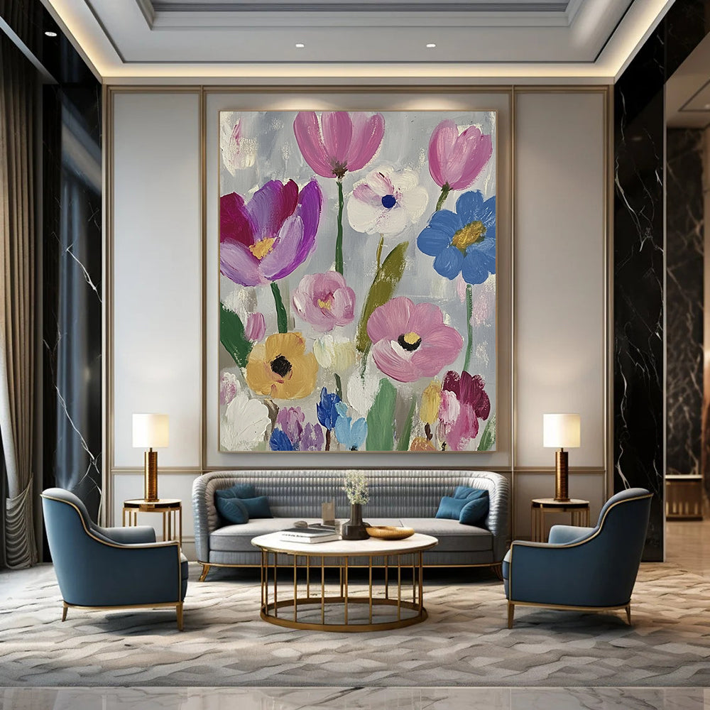Large contemporary abstract painting featuring vibrant daisies and tulips in pink purple blue green and yellow against a soft gray backdrop with visible brush strokes. DLZ1262