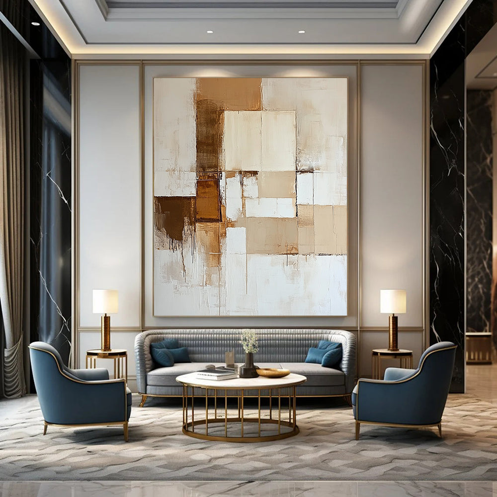 Contemporary hand-painted abstract artwork features neutral tones of beige and white with dynamic color blocks and a striking brown accent. DLZ0527