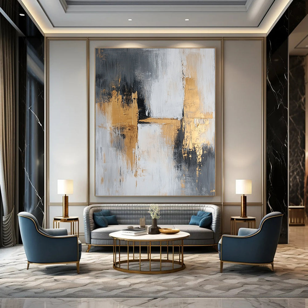 Large contemporary abstract painting featuring gray and gold tones with textured brush strokes that evoke calmness and tranquility on a spacious canvas. DLZ0709