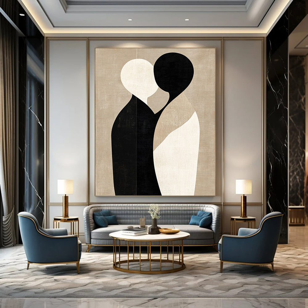 Large contemporary abstract art featuring minimalist shapes in black and beige, embracing forms on a textured light brown background. DLZ1464
