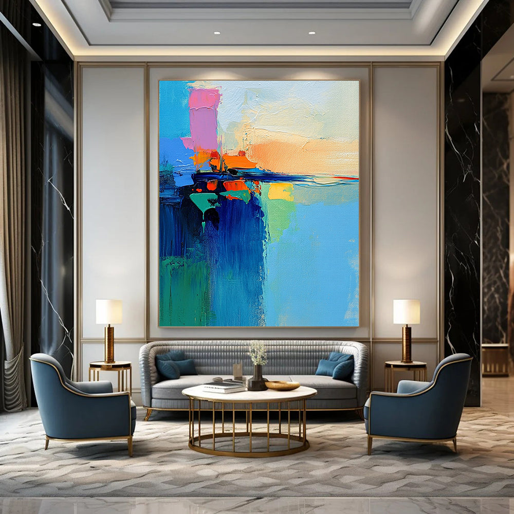 Contemporary abstract art featuring a vibrant lake and sky painted with a palette knife in dynamic brush strokes of blue green orange pink and yellow. DLZ0469