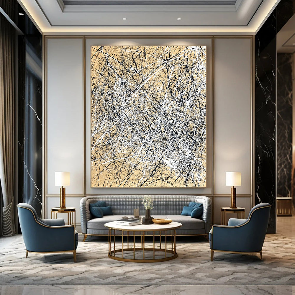 Contemporary hand-painted abstract artwork features dynamic brush strokes and expressive composition in white and black against a light brown background. DLZ1162