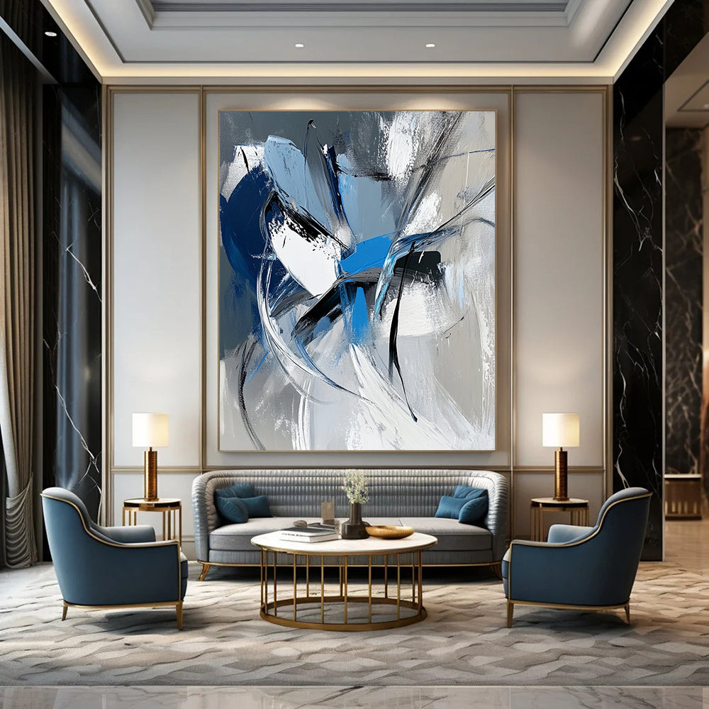 Large contemporary hand-painted abstract art featuring dynamic white gray and blue shapes with bold brushstrokes and a vibrant urban energy. DLZ1008