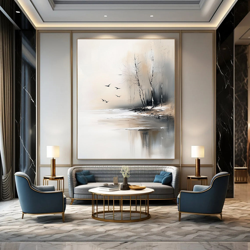 Large contemporary abstract painting featuring serene trees by an ice-covered lake with flying birds in soft gray and beige tones. DLZ0411