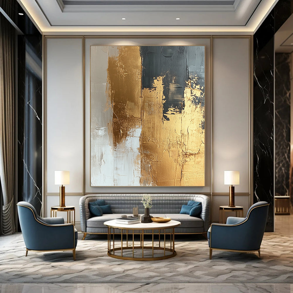 Contemporary abstract painting featuring textured gold foil on a beige and white canvas showcasing dynamic brushstrokes and a refined neutral palette. DLZ1019