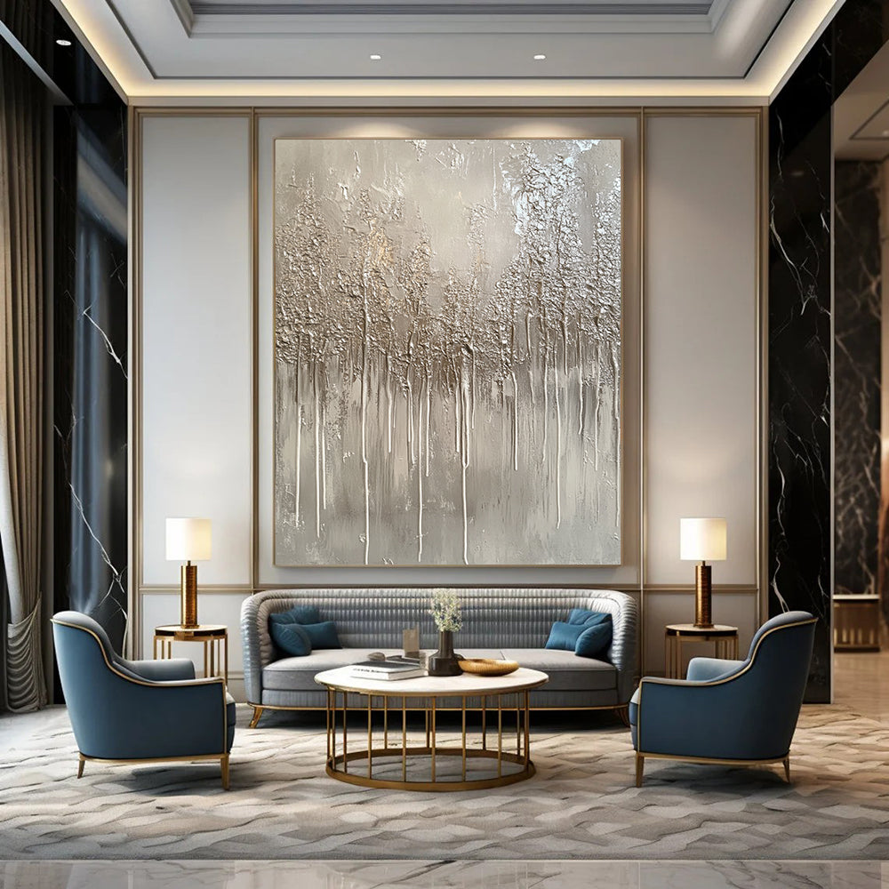 Large contemporary hand-painted abstract artwork featuring a monochromatic gray palette with drips and metallic silver accents evoking winter landscapes. DLZ1517