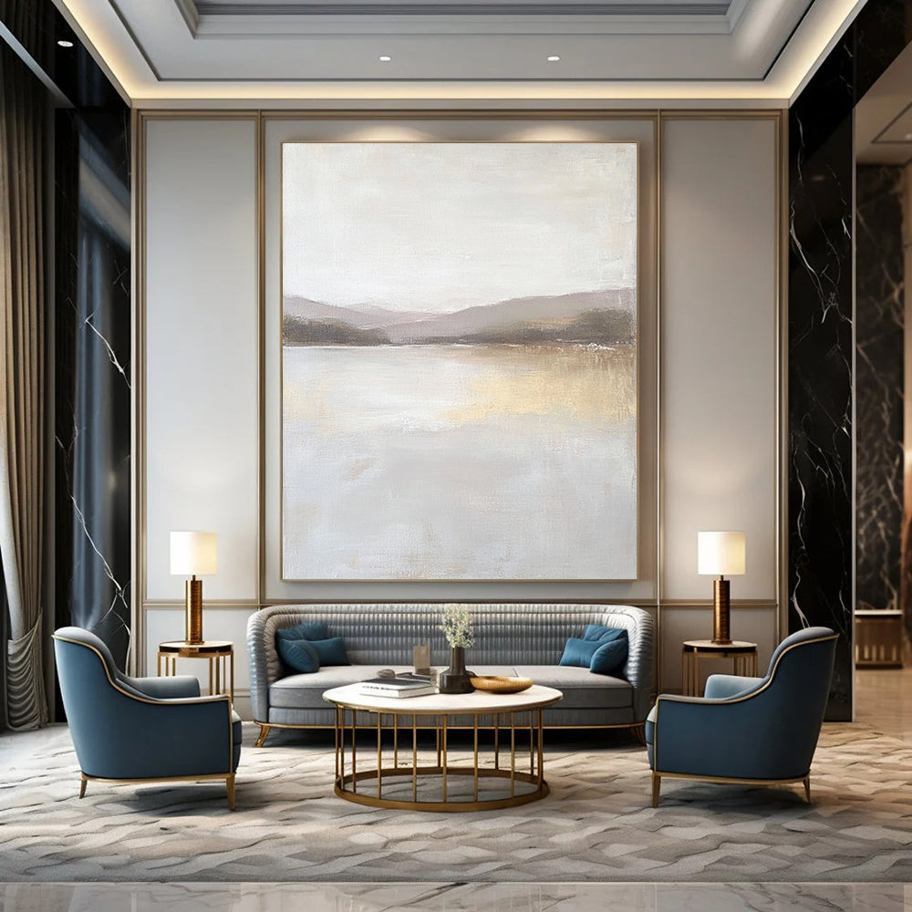 Contemporary abstract painting featuring a large lake in muted beige and gray tones with textured canvas and distant hills in the background. DLZ0415