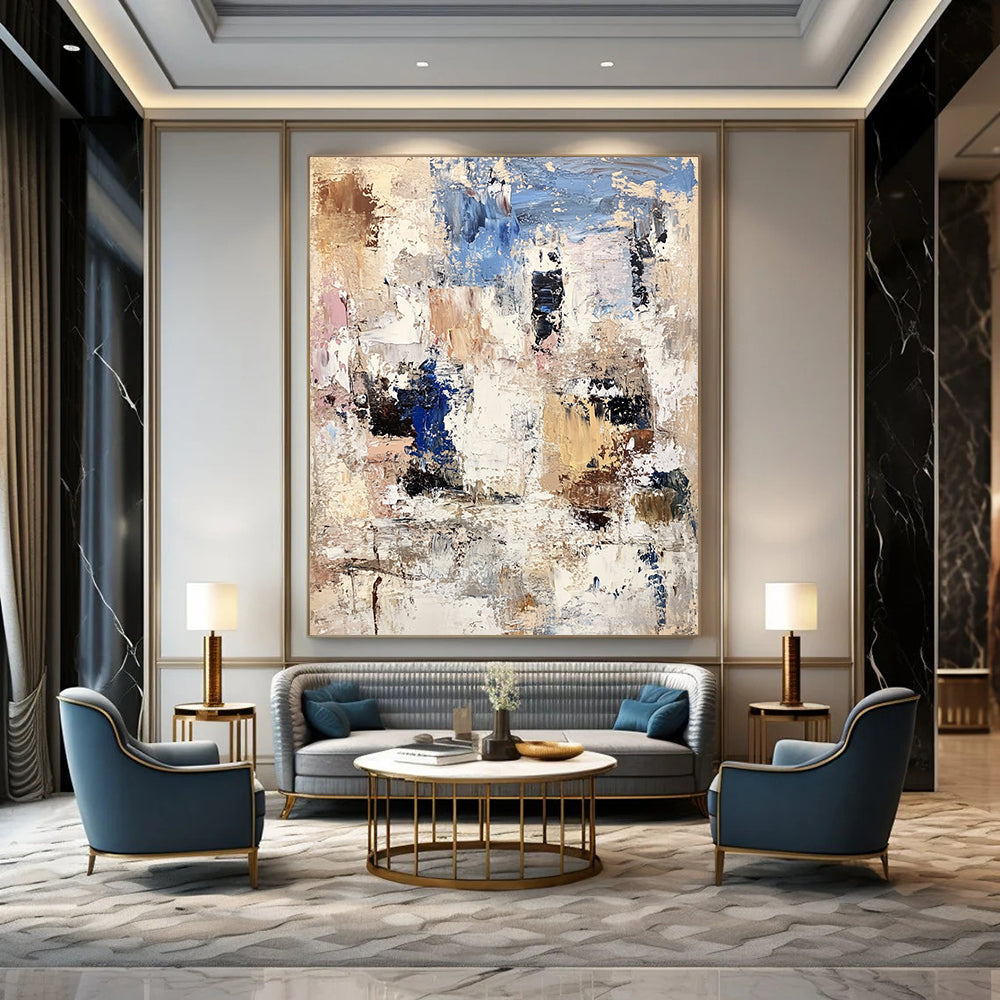 Contemporary abstract artwork showcasing textured white rocks and buildings with bold brushstrokes in beige, brown, blue, and gray. DLZ0898