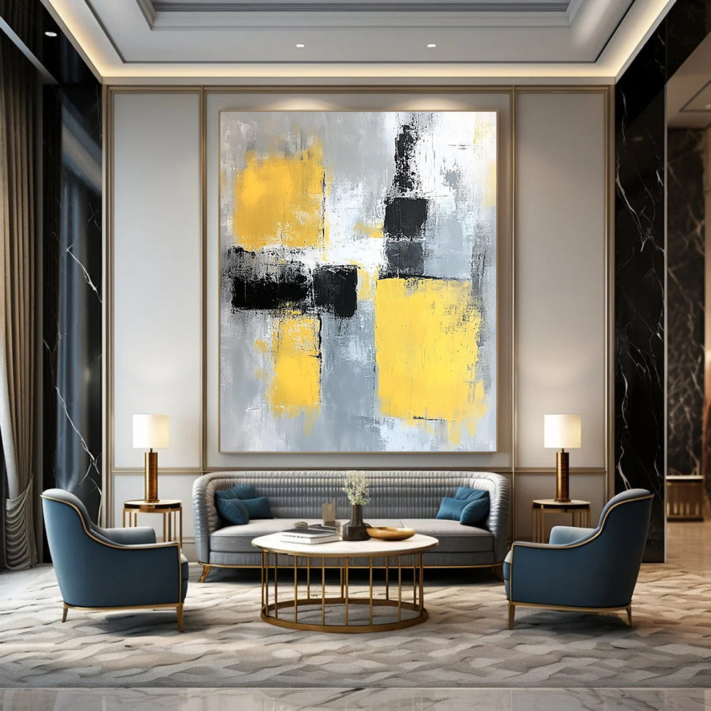Contemporary abstract painting featuring gray and yellow color blocks with soft edges and dynamic brush strokes on a large canvas. DLZ0522