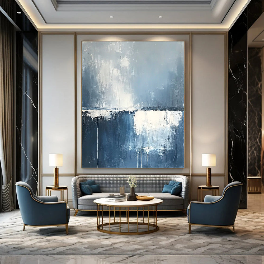 Contemporary hand-painted abstract art featuring misty clouds and rain over the ocean in soothing blue and grey tones with soft white edges. DLZ0630